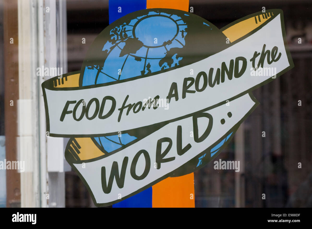 Food from around the world sign on a New York Deli Brighton England Stock Photo