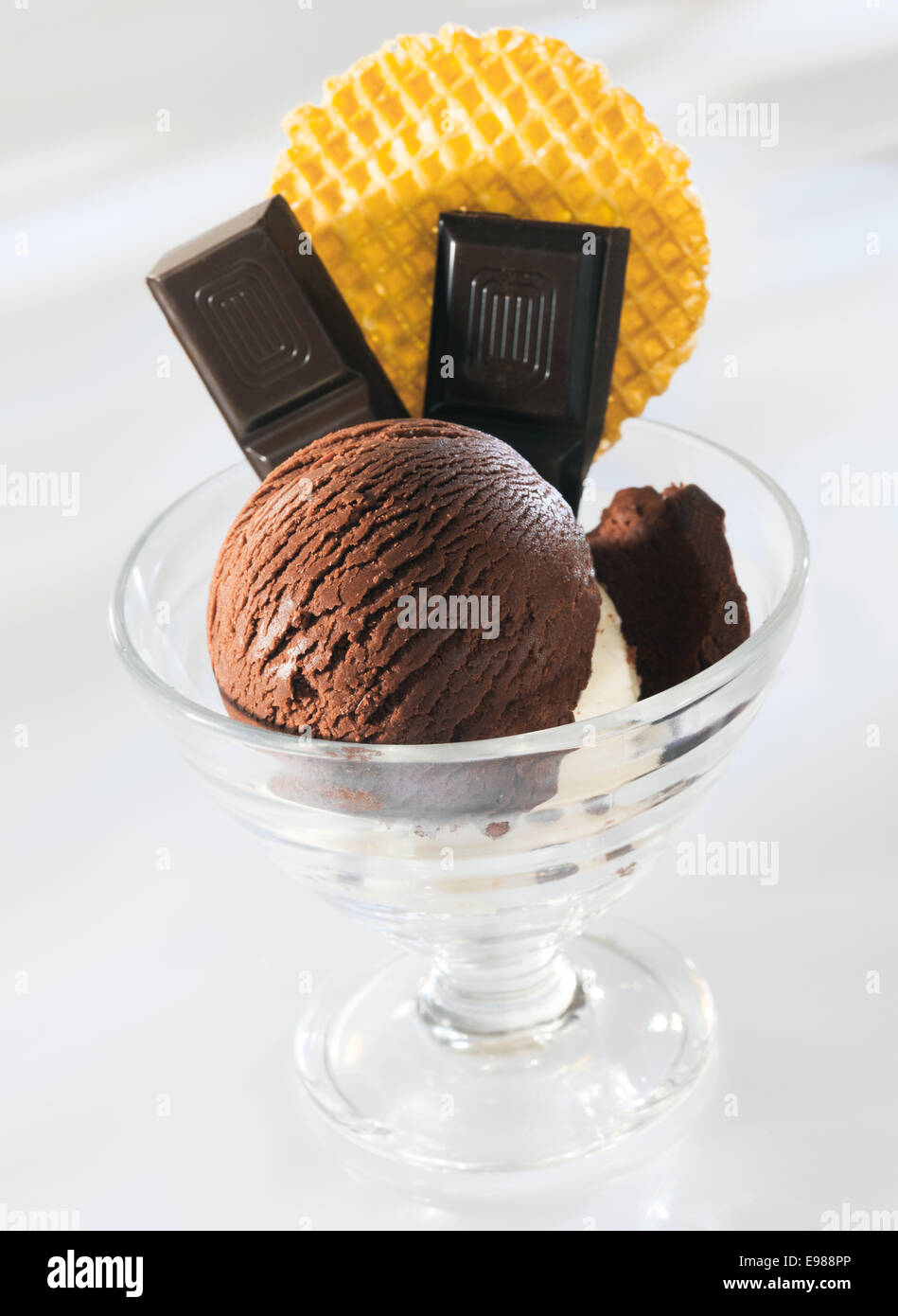 Decadent chocolate dessert with rich creamy chocolate icecream mixed with squares of slab chocolate Stock Photo