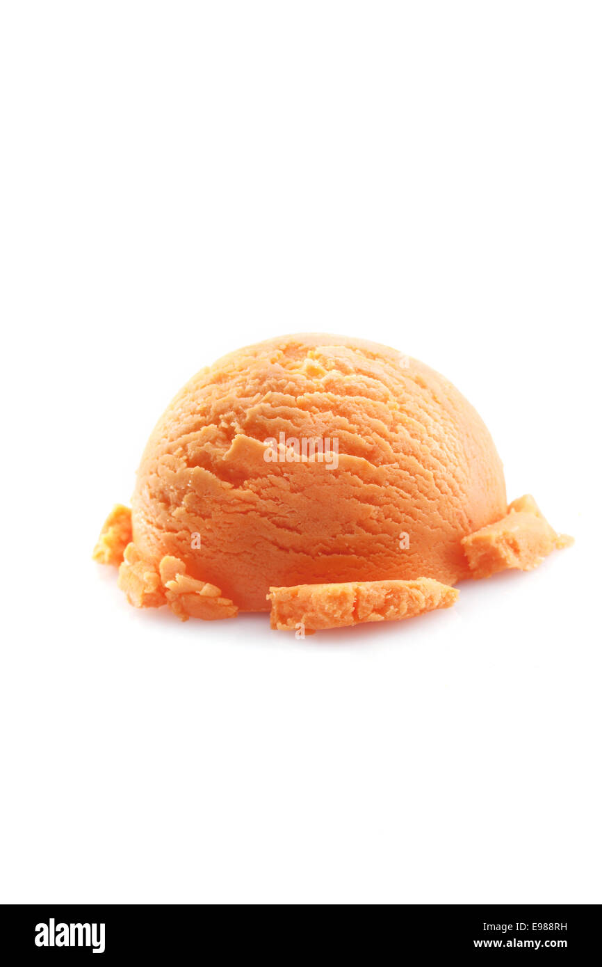 Mango ice cream scoop isolated on white background. Stock Photo