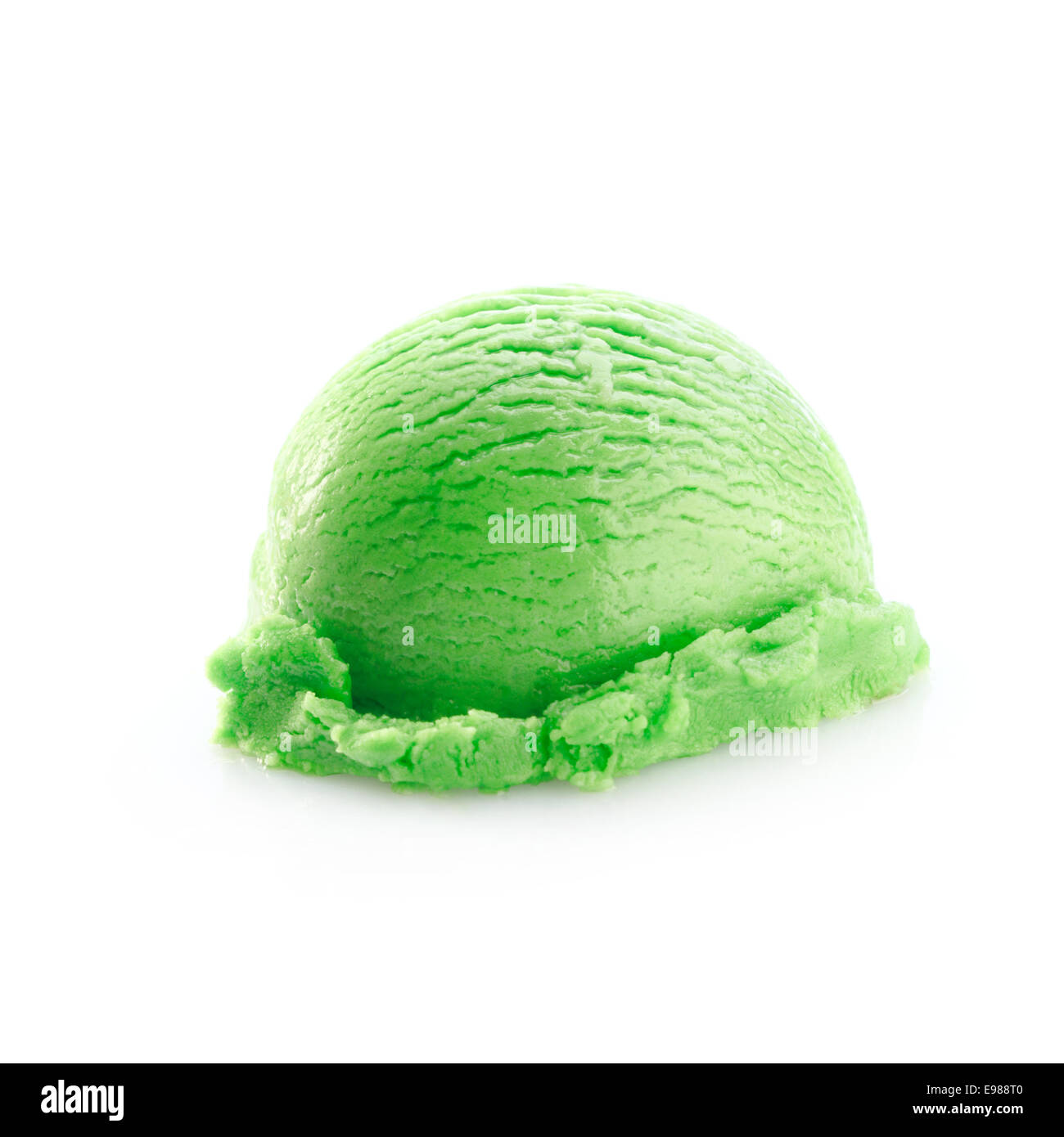 One green scoop of icecream isolated on white background Stock Photo