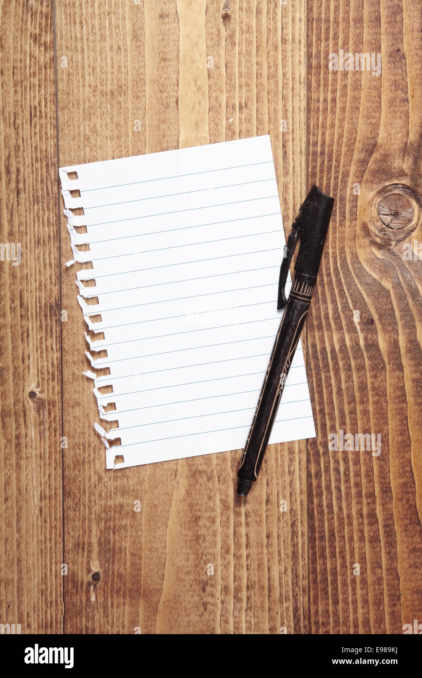 Blank paper page with a ballpen over it, close up Stock Photo