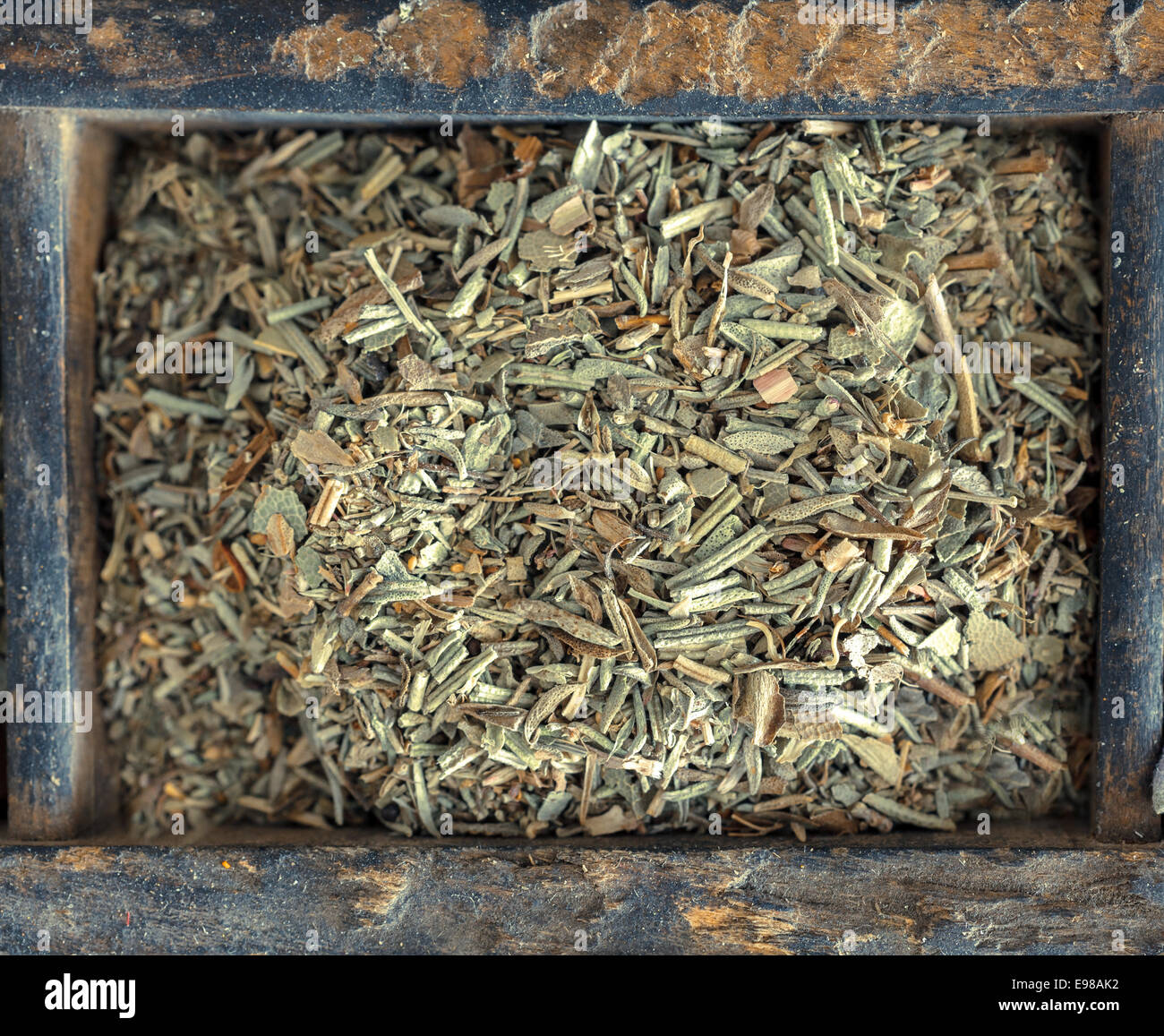 Overhead view of mixed dried herbs with a blend of rosemary, sage, thyme and oregano used as a seasoning in cookery Stock Photo