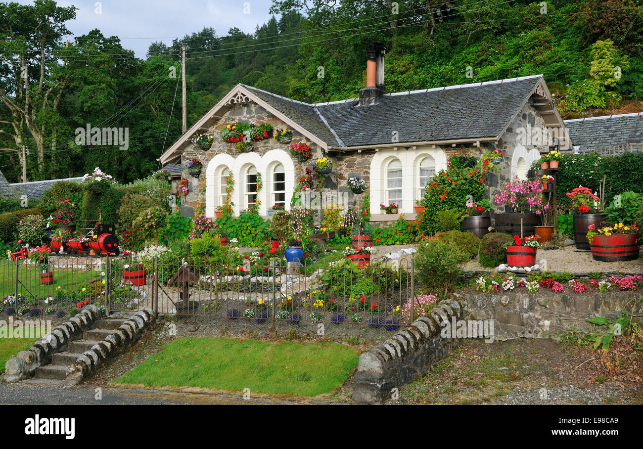 Stone cottage with flower garden, Aldochlay, Loch Lomond, Scotland