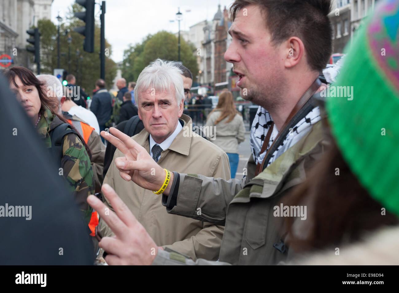 Parliament Square, London, UK. 21st October 2014. Parliament Square green is declared out of bounds by police as they deterred Occupy protesters demonstrating in the public space. Pictured:  John McDonnell MP visits Occupy demonstrators at Parliament Square. Credit:  Lee Thomas/Alamy Live News Stock Photo