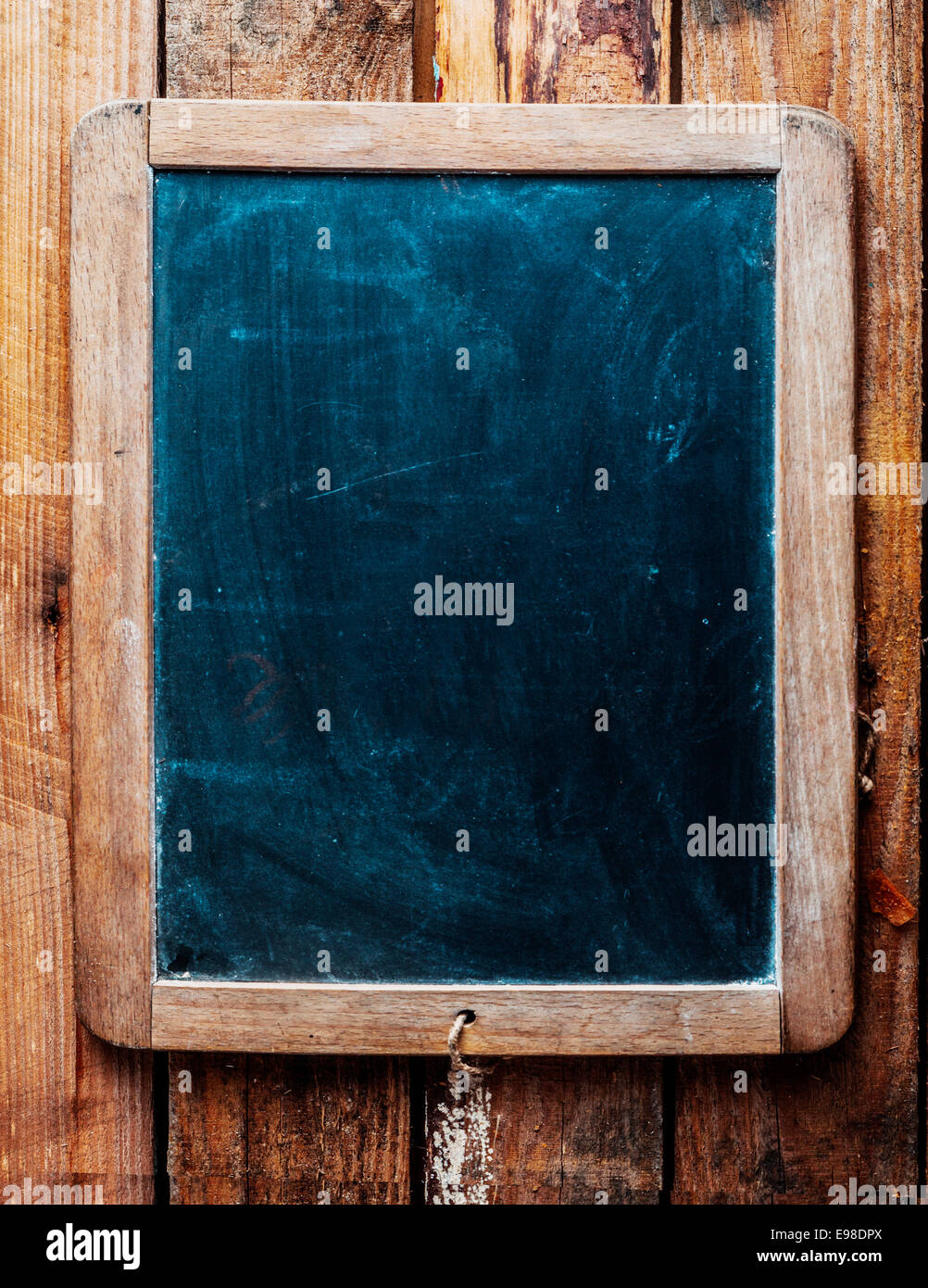 vintage style wood framed chalkboard over old wood background space