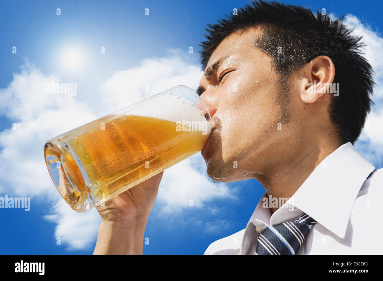Japanese businessman drinking draft beer Stock Photo Alamy
