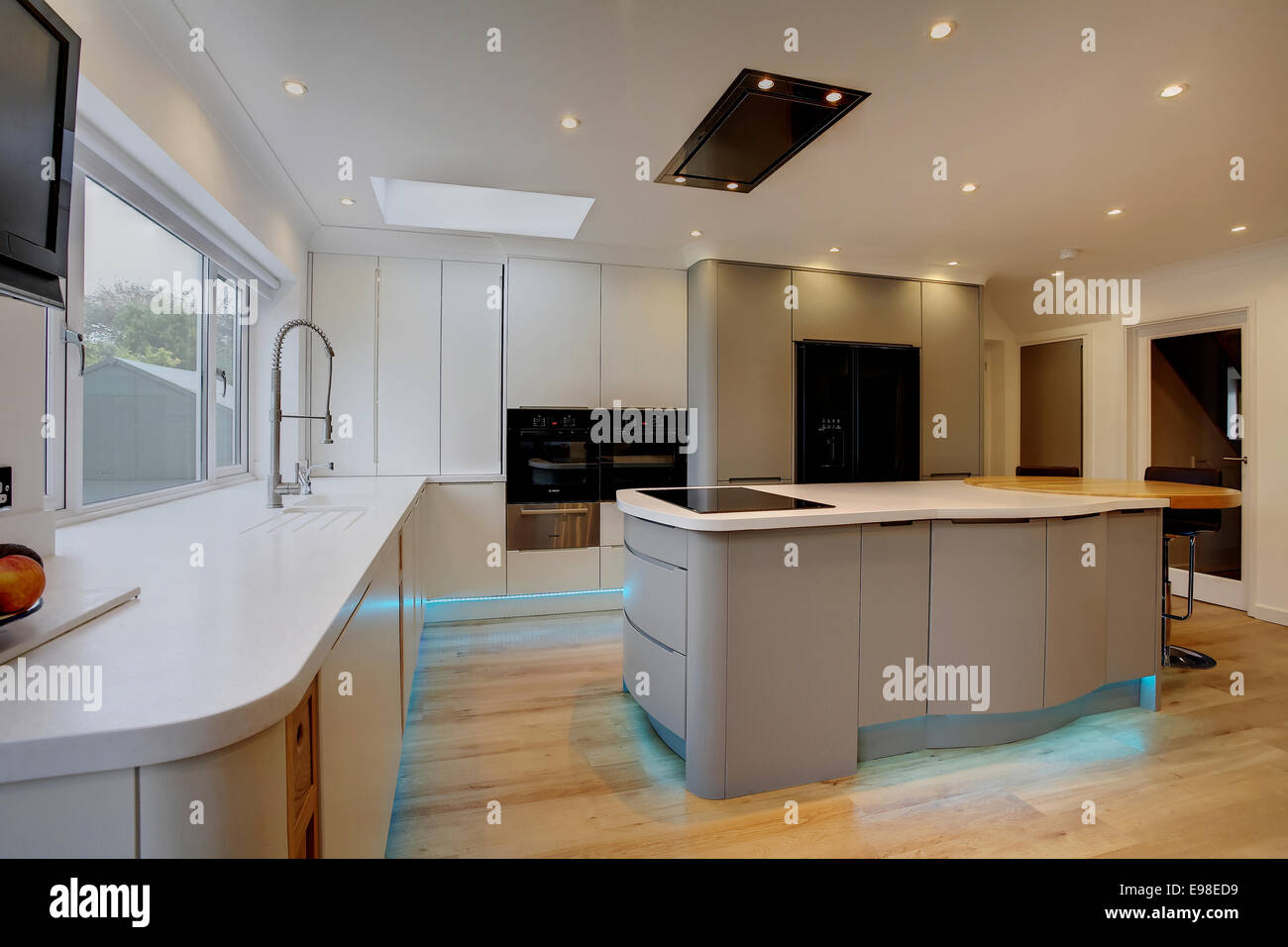 A modern kitchen inside a home in the UK Stock Photo Alamy