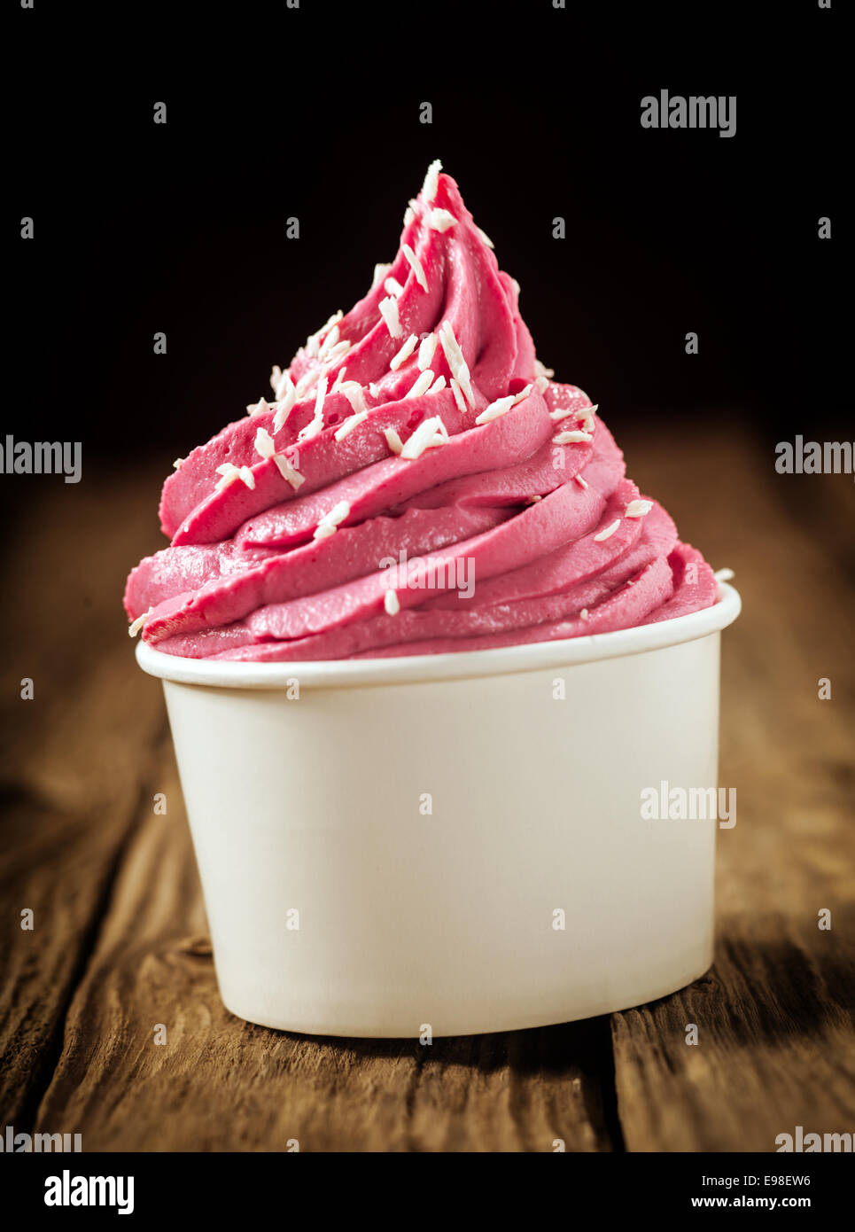 https://c8.alamy.com/comp/E98EW6/twirl-of-delicious-berry-ice-cream-or-frozen-yoghurt-in-a-plastic-E98EW6.jpg