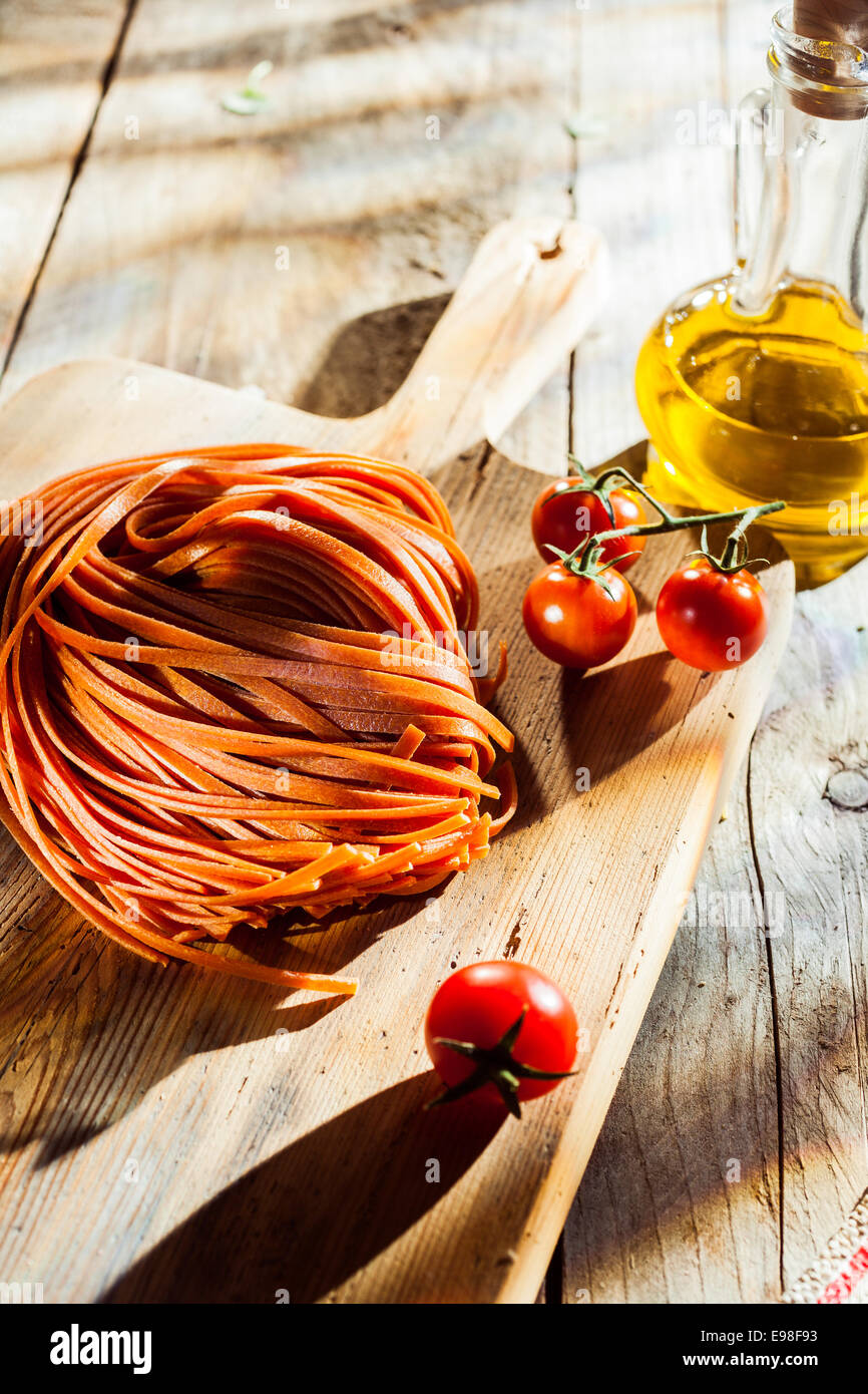 Ingredients for a tasty Italian tomato pasta dish with flavored