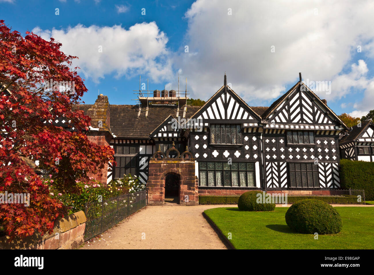 Black and white timber framed medieval mansion house and gardens. Stock Photo