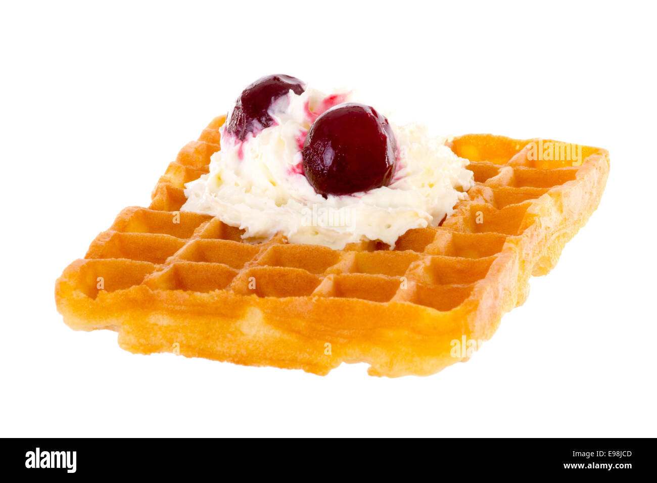 Brussels waffle with cream and cherries brightened Stock Photo