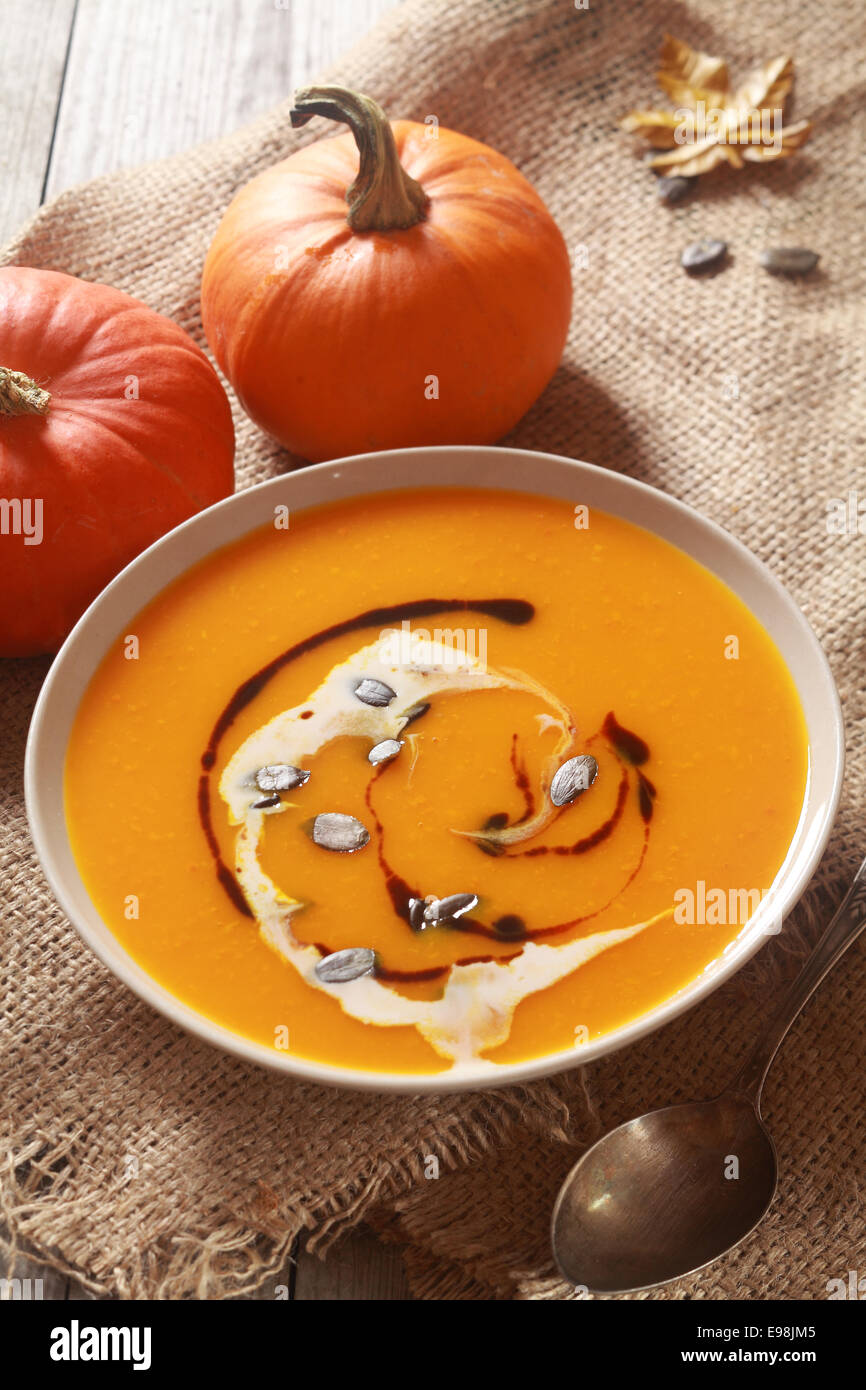 Homemade pumpkin soup for Thanksgiving dinner with fresh ingredients