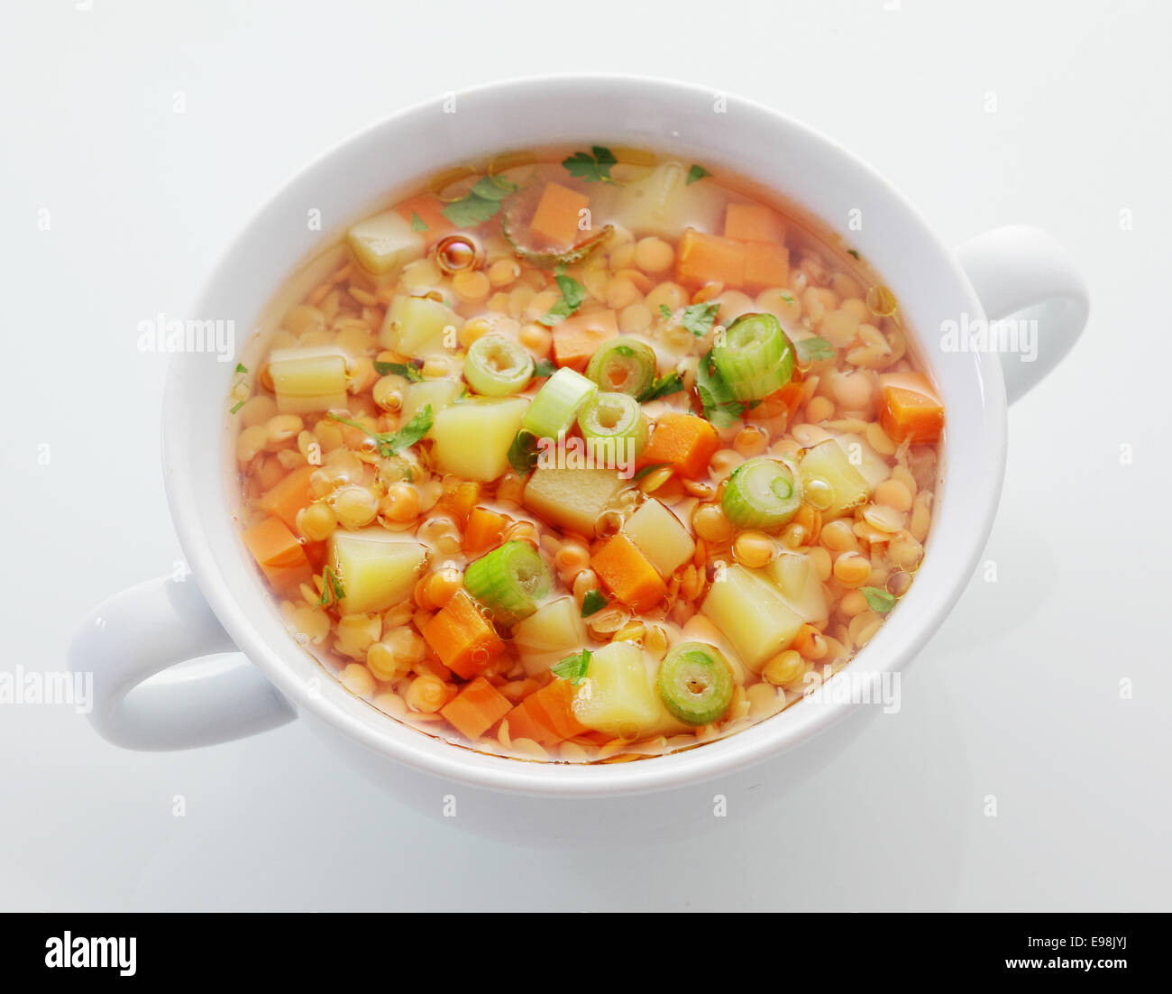 Wholesome bowl of lentil, carrot and leek soup rich in protein and
