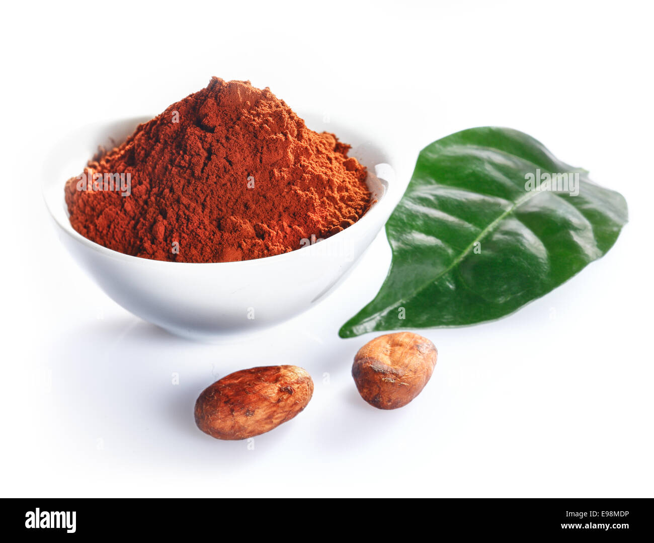 Cacao beans, leaf and cacao powder isolated on white Stock Photo