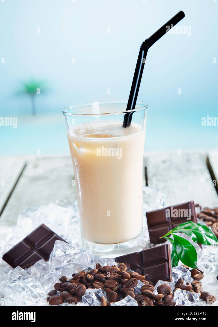 Chilled cafe mocha on ice enjoyed through a straw for a refreshing drink Stock Photo