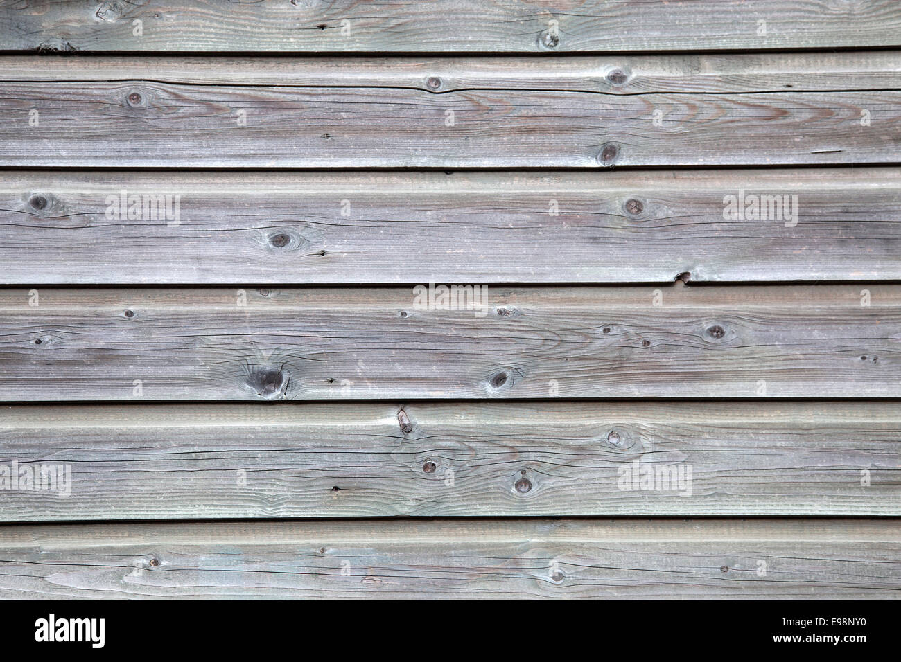 background consisting of old fence with gray planks Stock Photo - Alamy