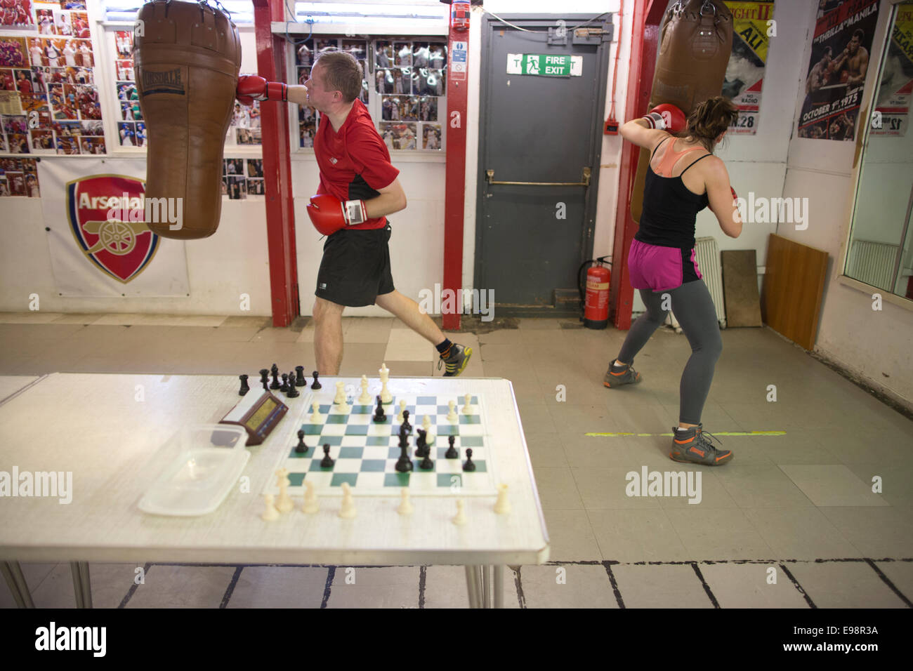 Chessboxing, boxing and chess board game being played alternately