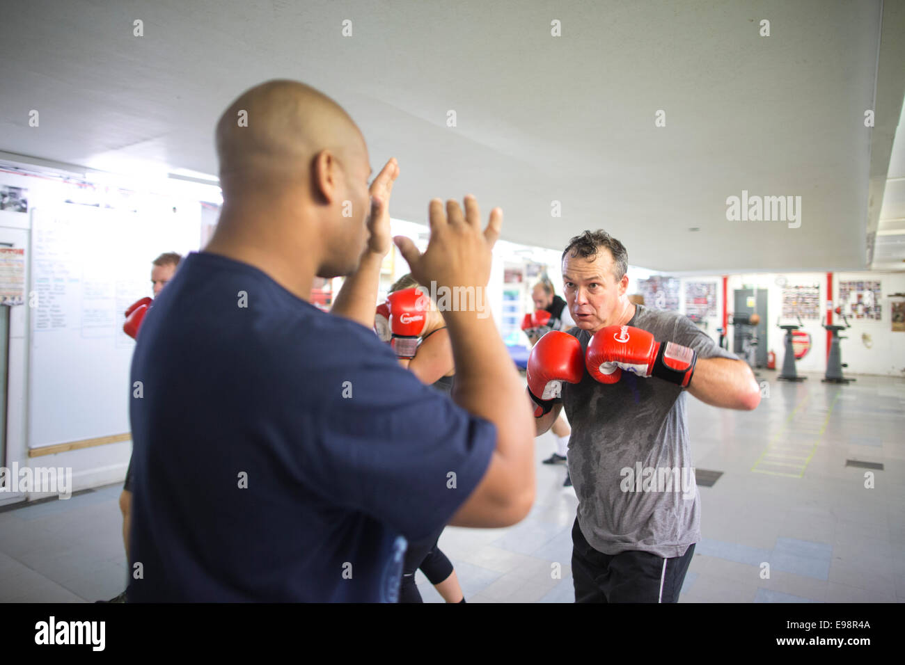 Chessboxing, boxing and chess board game being played alternately as part  of a new surreal sport, Islington, London, UK Stock Photo - Alamy