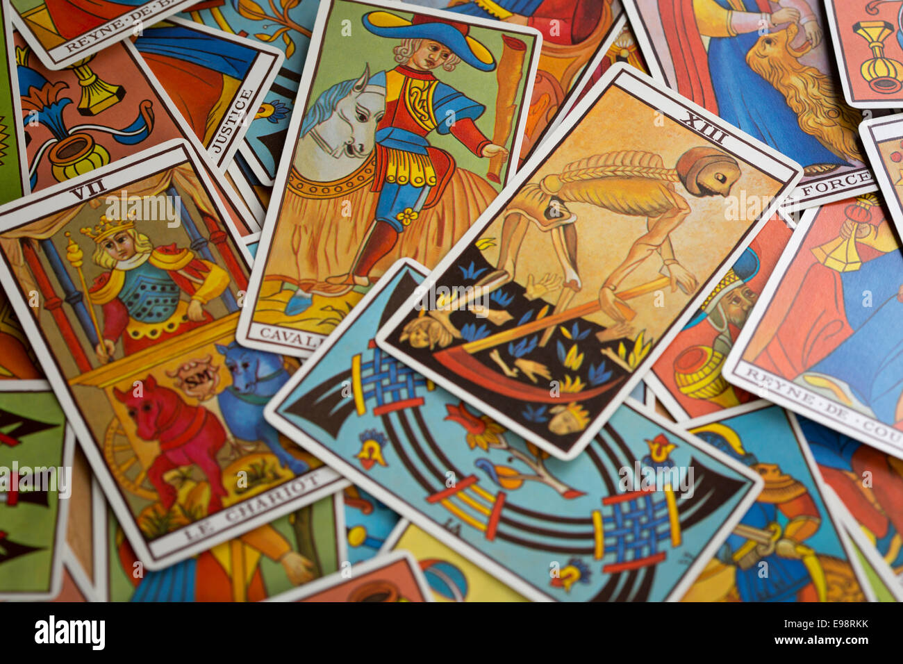 tarot cards spread out on table Stock Photo