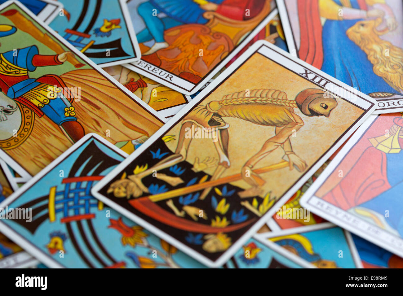 tarot cards spread out on table Stock Photo