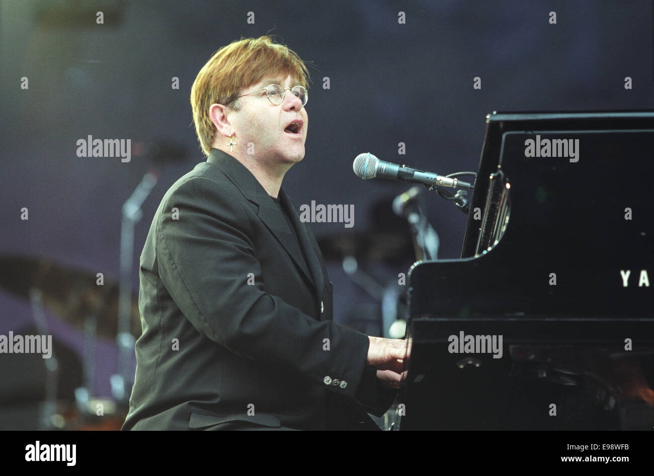 English singer songwriter Elton John in concert in Glasgow, Scotland, in 1998. Stock Photo