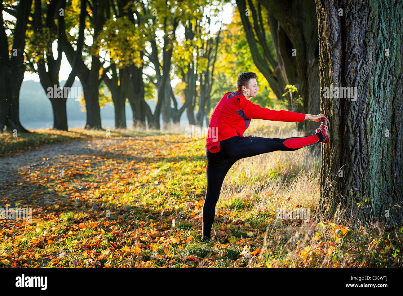 sport man stretching at the park Stock Photo
