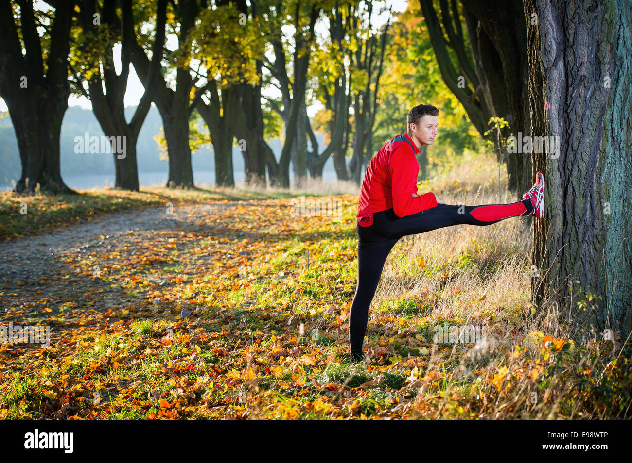 sport man stretching at the park Stock Photo