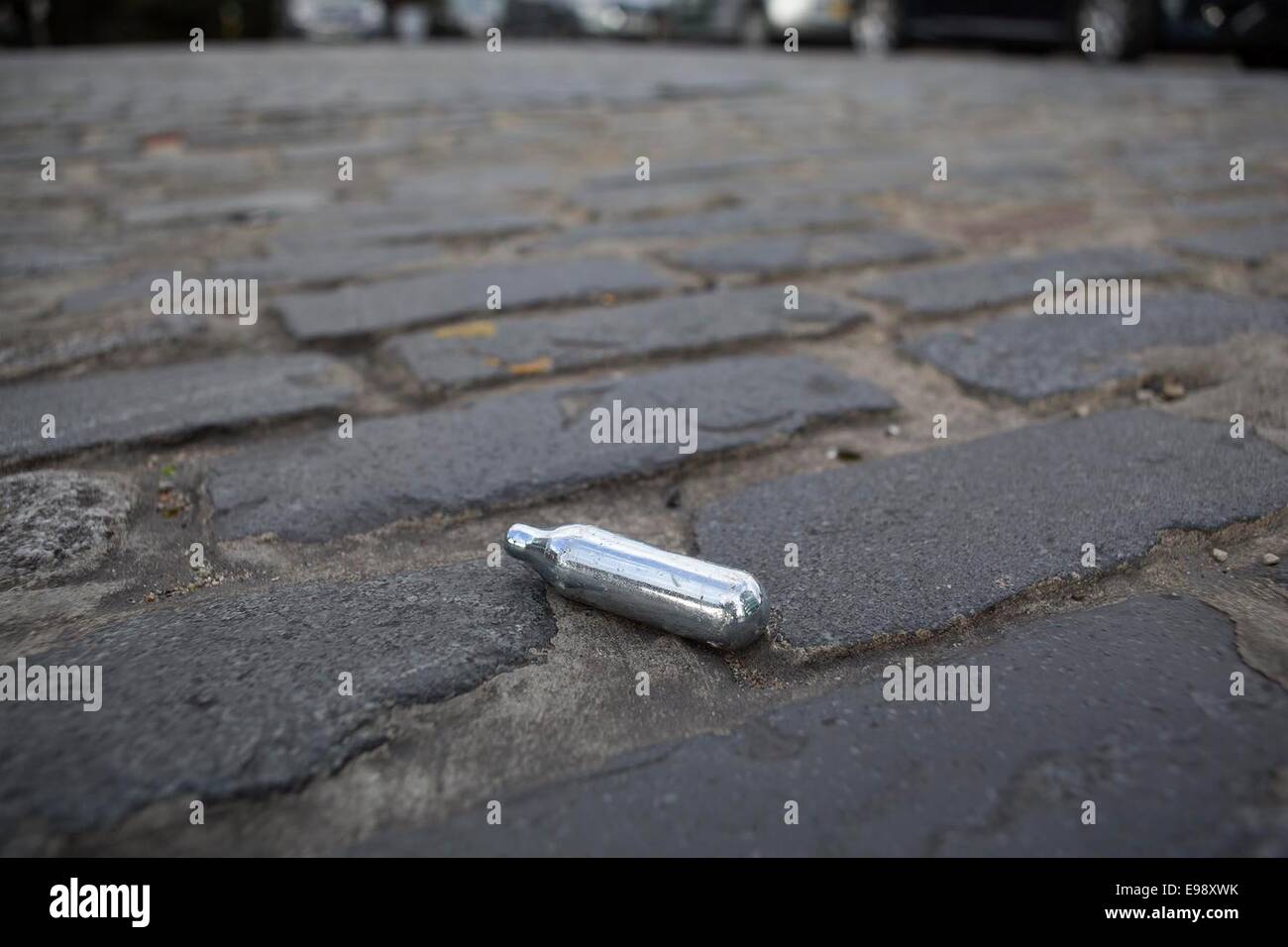 Small empty cannister of laughing gas. Nitrous oxide, nitrous, nitro, or NOS is an increasingly