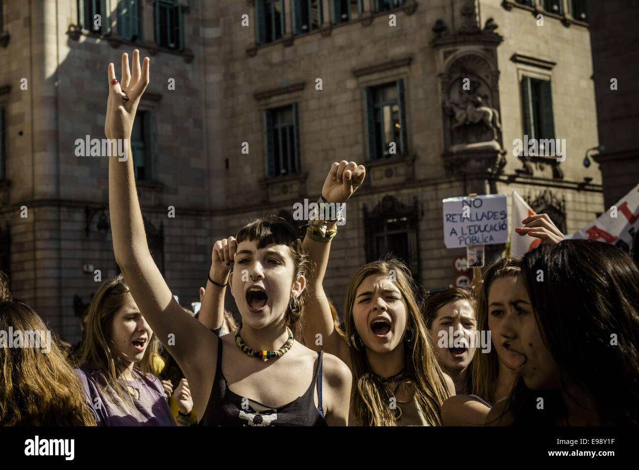 Barcelona, Spain. 22nd October, 2014. Demonstrators shout slogans during a protest made by a few thousand students against the education reform known as the 'Wert law' in front of the Catalan Government Credit:  Matthias Oesterle/ZUMA Wire/ZUMAPRESS.com/Alamy Live News Stock Photo