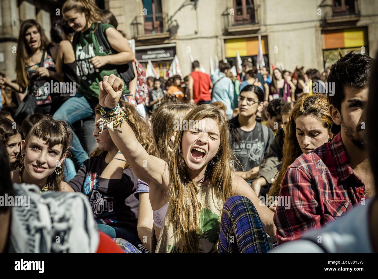 Barcelona, Spain. 22nd October, 2014. Demonstrators shout slogans during a protest made by a few thousand students against the education reform known as the 'Wert law' in front of the Catalan Government Credit:  Matthias Oesterle/ZUMA Wire/ZUMAPRESS.com/Alamy Live News Stock Photo