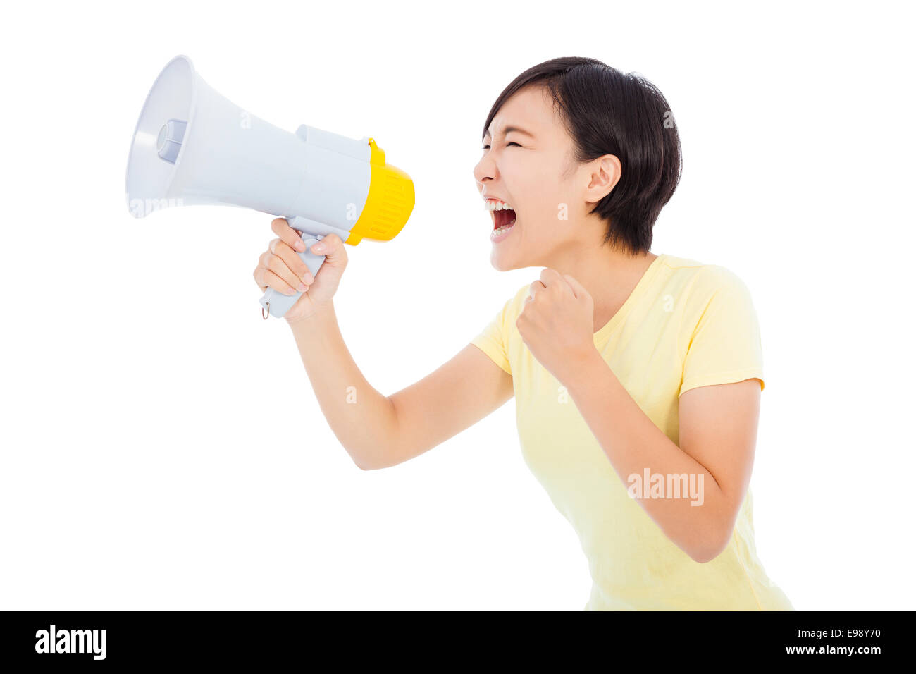 happy young student girl standing and holding megaphone Stock Photo