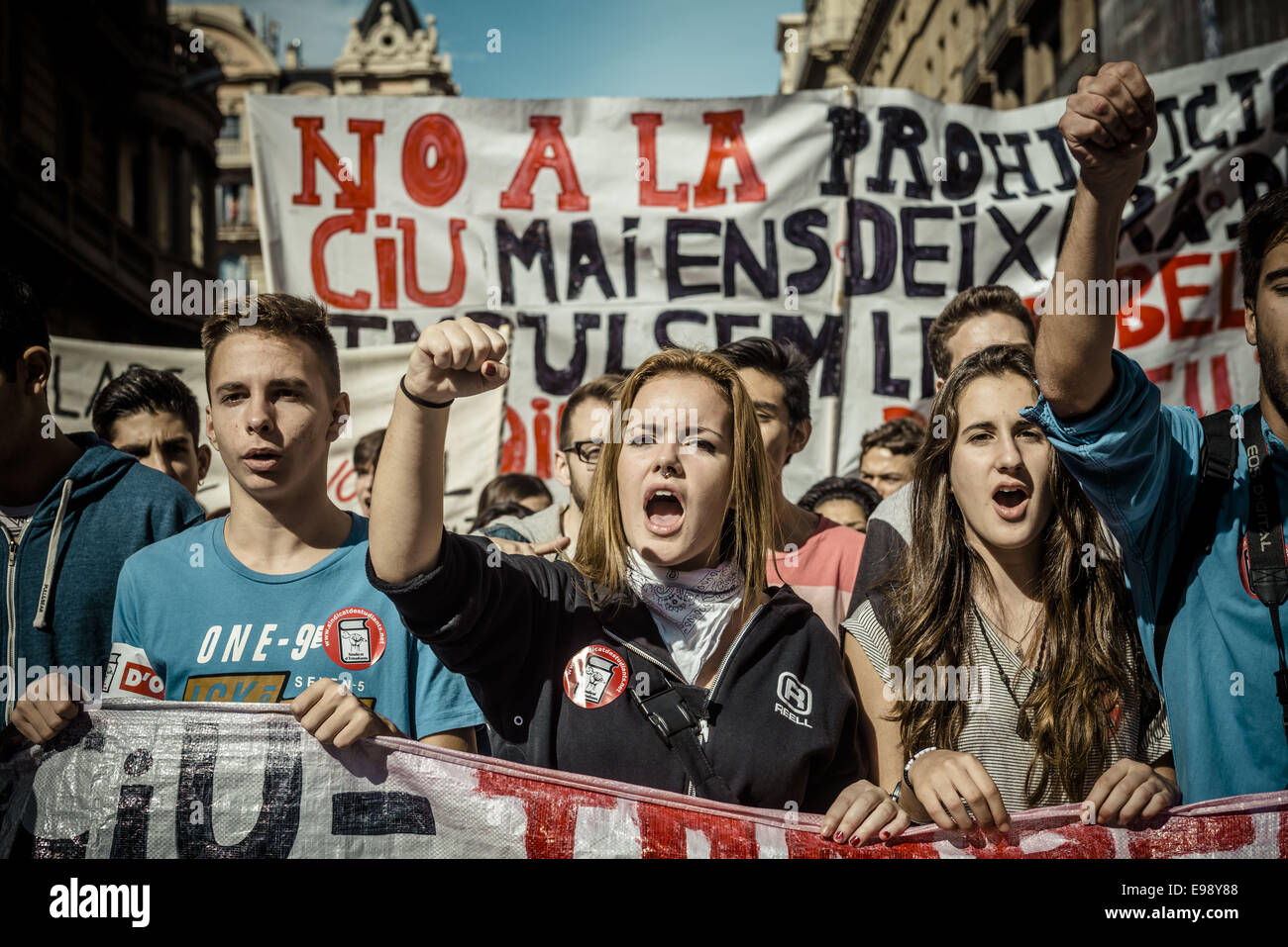 Barcelona, Spain. 22nd October, 2014. Demonstrators behind their shout slogans during a march through Barcelona made by a few thousand students against the education reform known as the 'Wert law' Credit:  Matthias Oesterle/ZUMA Wire/ZUMAPRESS.com/Alamy Live News Stock Photo