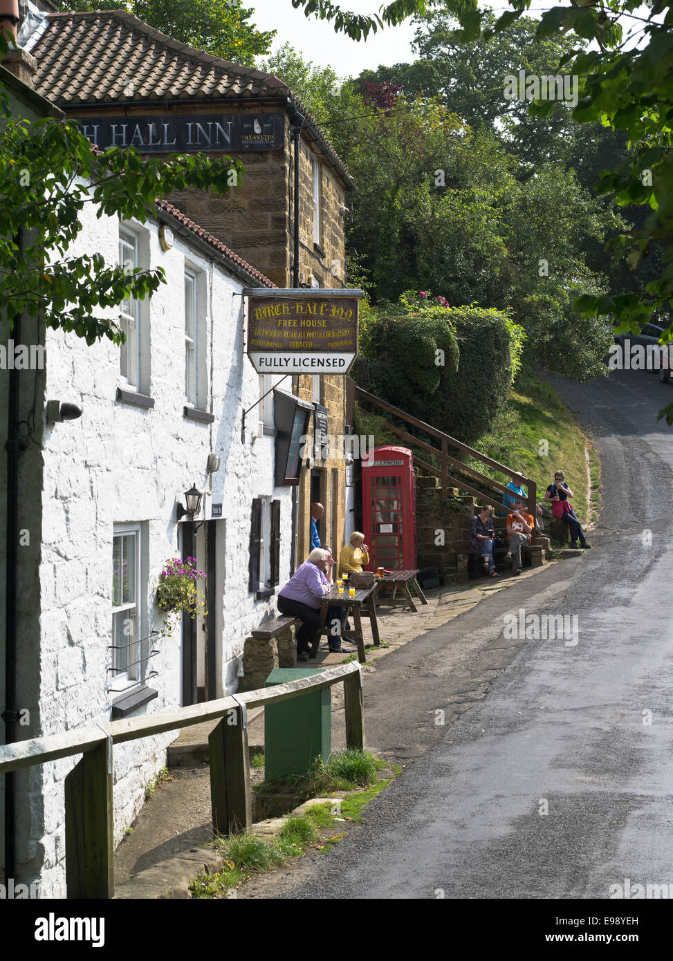 dh Birch Hall Inn Yorks Moors BECK HOLE PUB NORTH YORKSHIRE UK People outside traditional public house drinking beer country village pubs summer Stock Photo