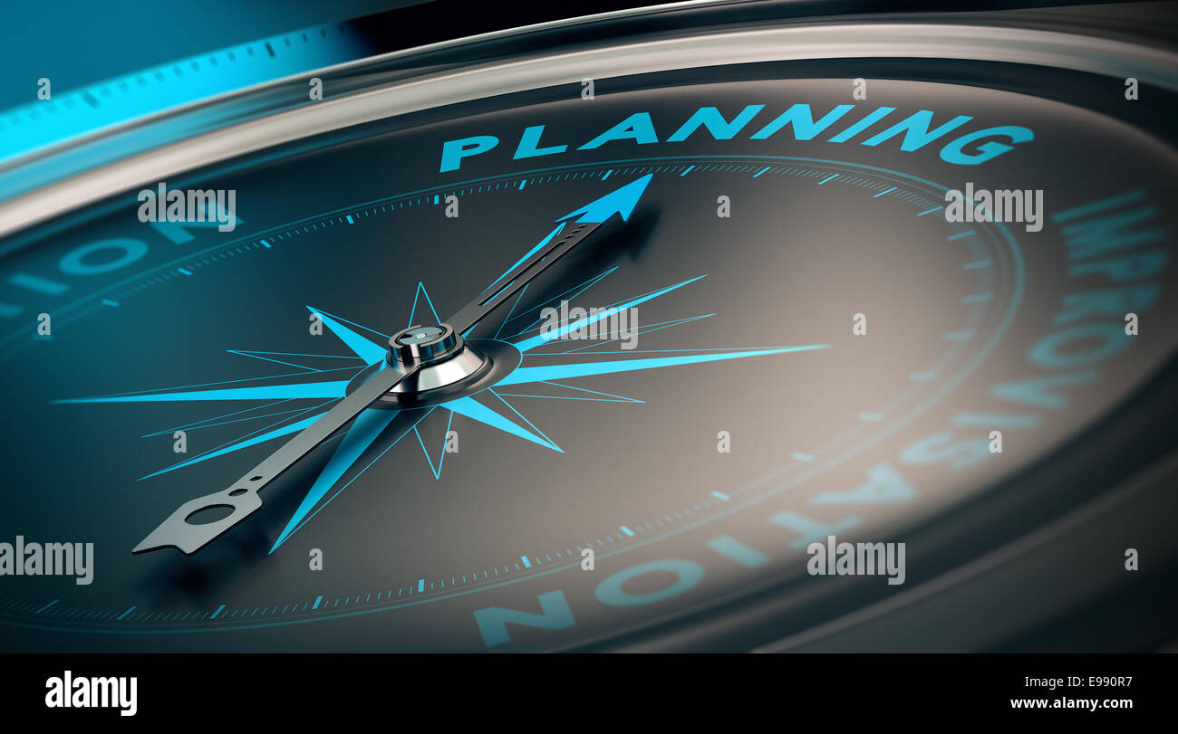 Compass with needle pointing the word planning, concept image to illustrate business plan and strategy. Stock Photo