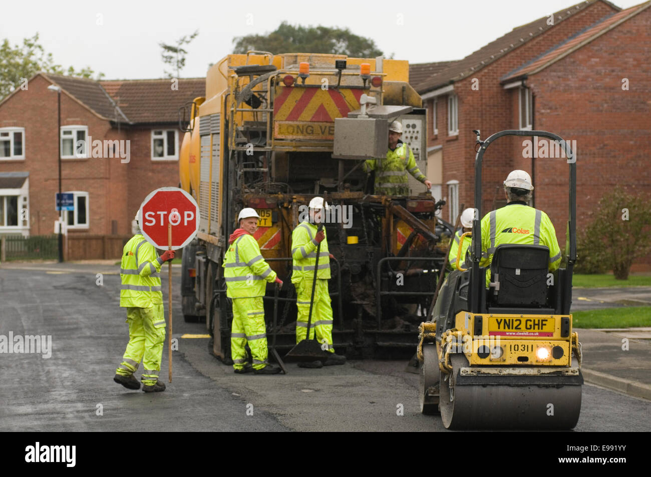 road maintenance repairs repairing Britain's roads Britain uk tarmac