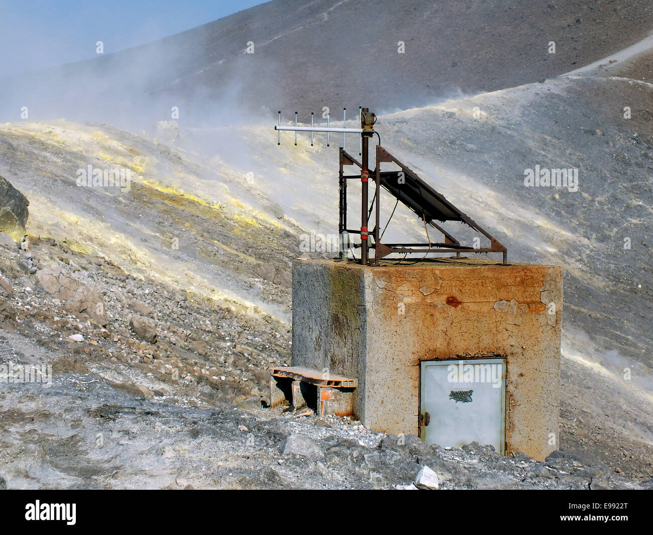 The measuring station at the edge of the Gran craters on the island of  Vulcano reports by radio volcanic activity to the headquarters in Catania -  June 2014 Stock Photo - Alamy