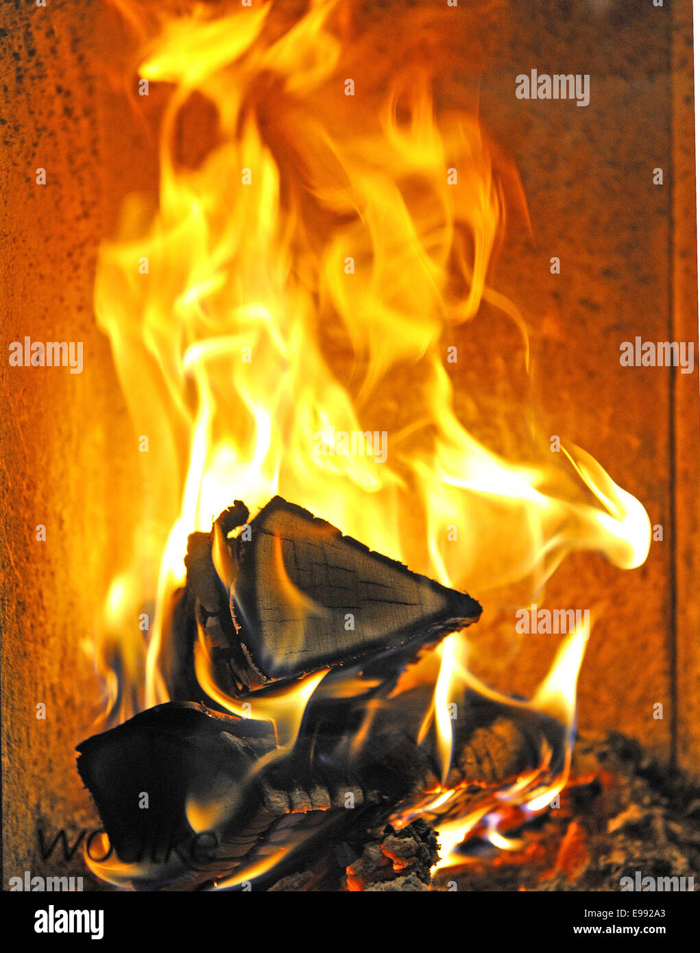 View of burning wood in modern stove  in Tuebingen, southern Germany, on  Oct. 22, 2009. , southern Germany,. Stock Photo