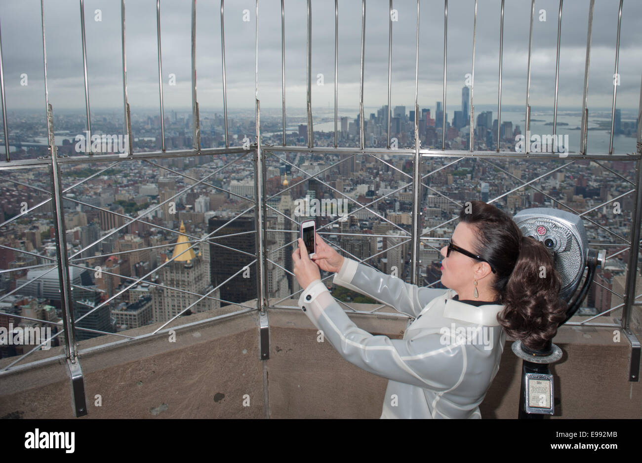 New York, USA. 22nd October, 2014. Actress DEBORAH MAZAR lights The Empire State Building red ...