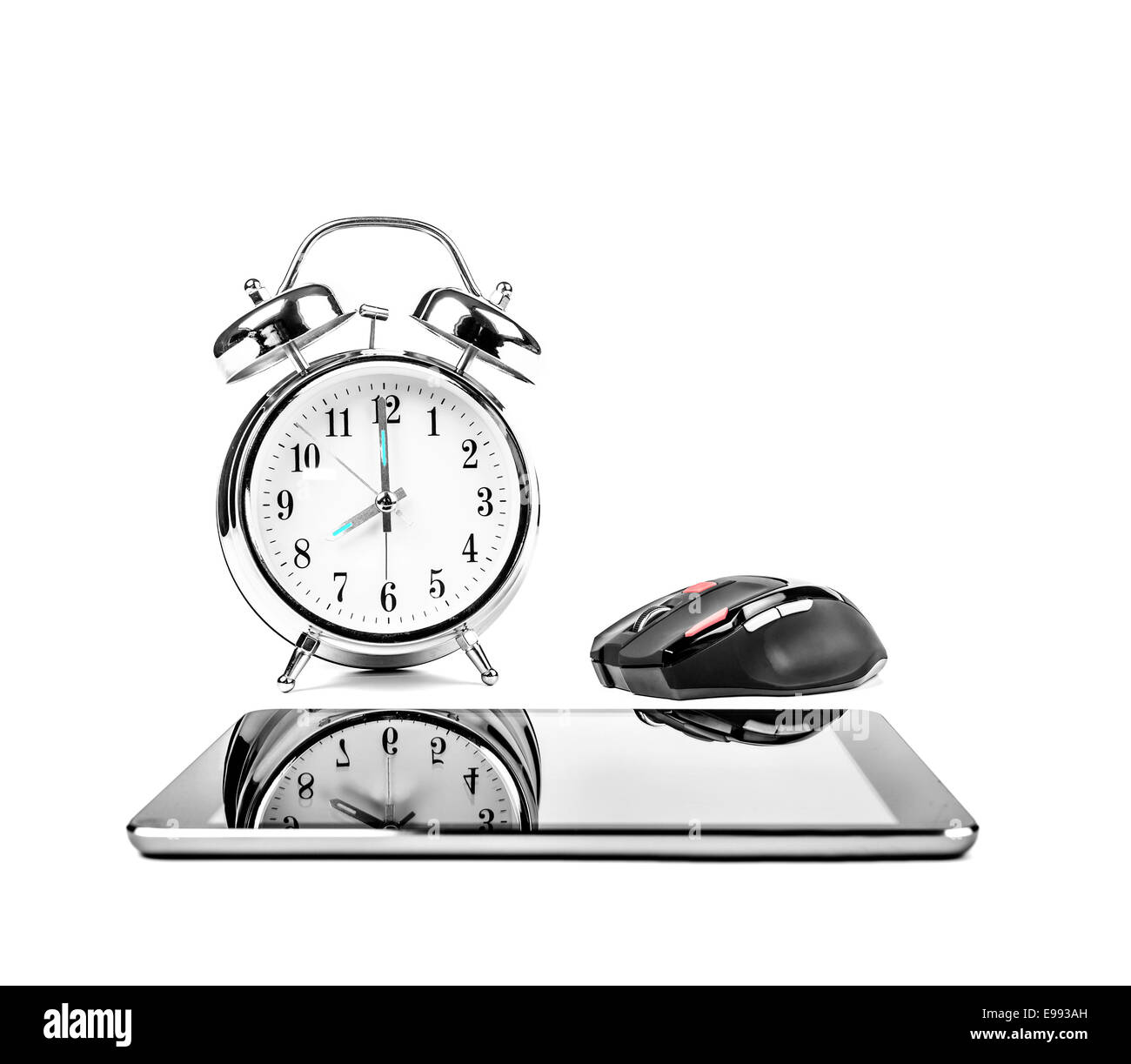 Tablet computer and alarm clock. Time and technology. Concept Stock Photo Alamy