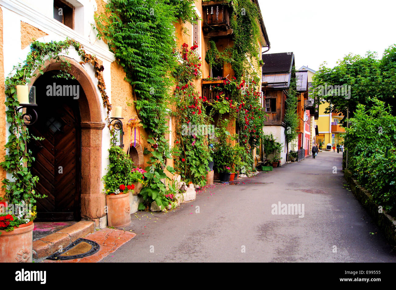 Flower lined street in the traditional Austrian village of Hallstatt Stock Photo
