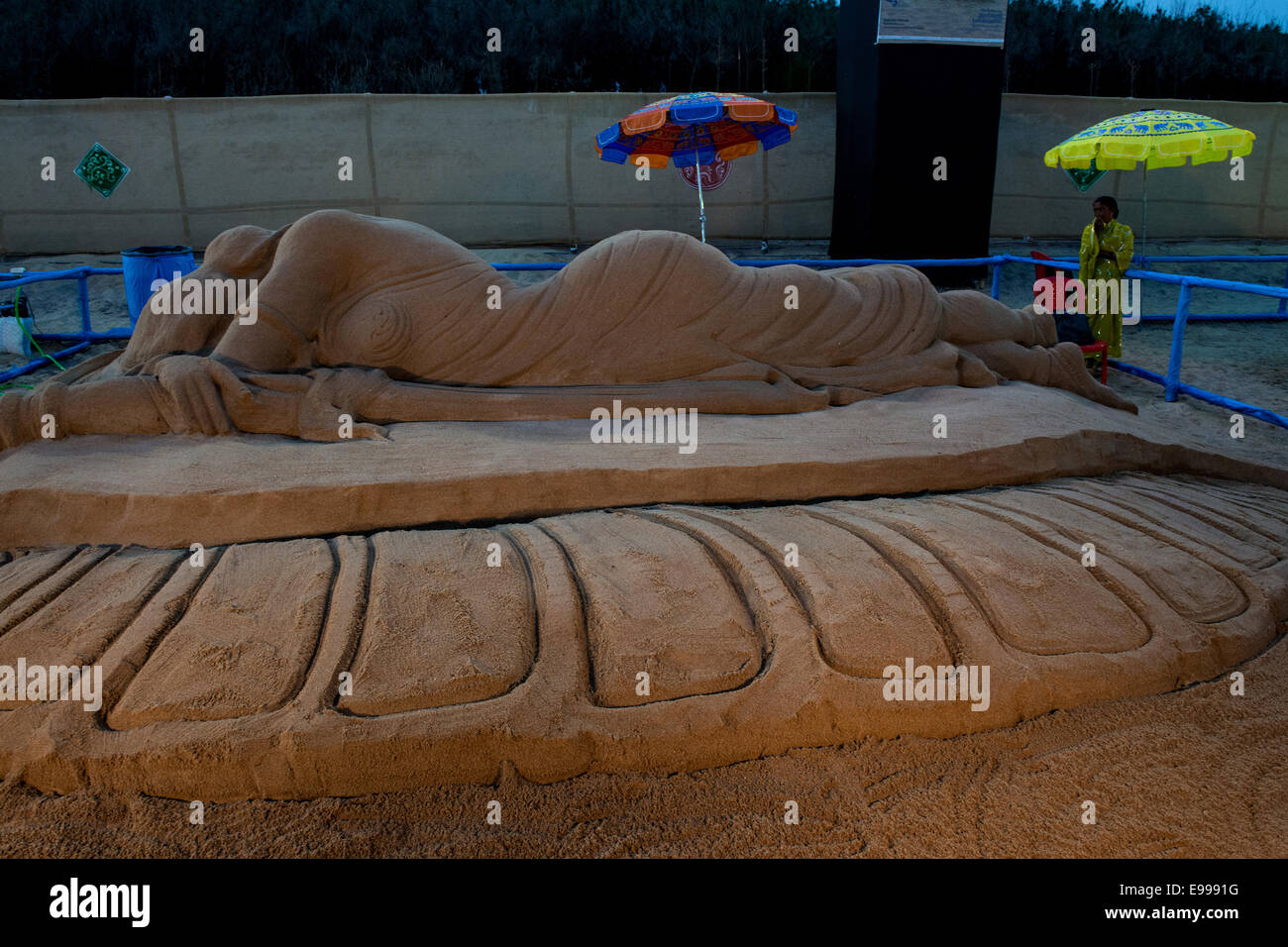 Female sculpture With sand on beach, Puri, Orissa, India Stock Photo