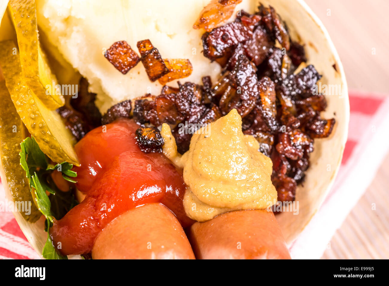 sausages and mash in a cone of flat cake (tortilla Stock Photo Alamy