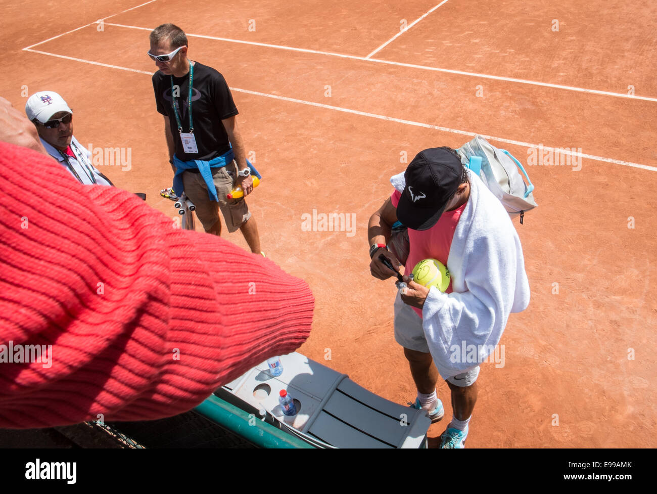 Spaniard Rafa Nadal signs signature,autograph for fans after end of his practice session practice court at Roland Garros,Paris. Stock Photo