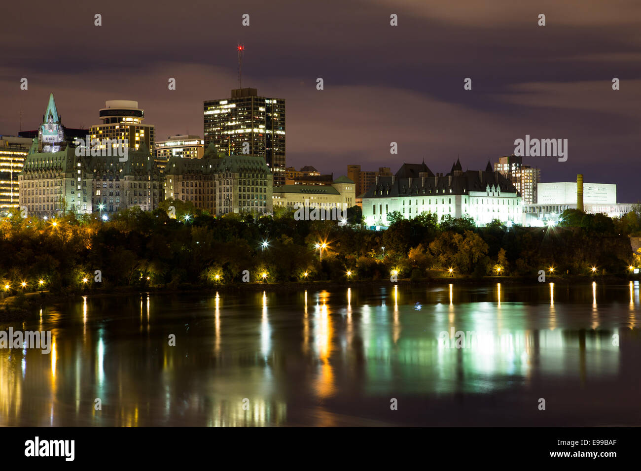 Part of the Ottawa Skyline at Night showing reflections in Ottawa River Stock Photo