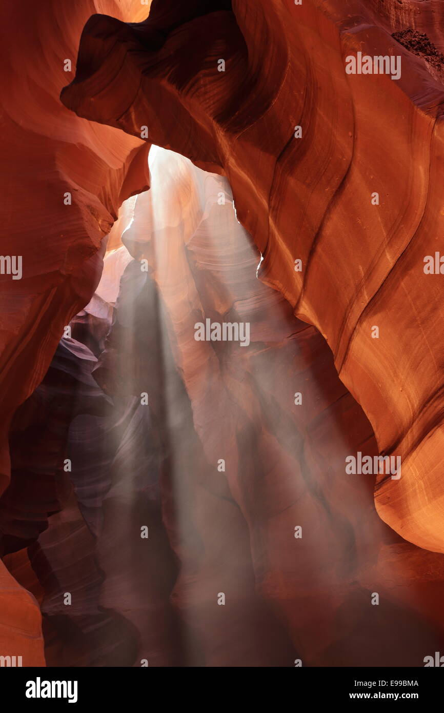 Light beams in glowing rock formations in Upper Antelope Canyon Stock Photo