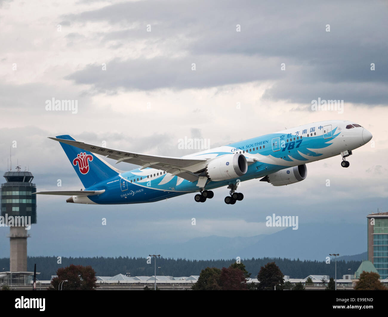 A China Southern Airlines Boeing 787-8 Dreamliner jetliner takes off from Vancouver International Airport. Stock Photo