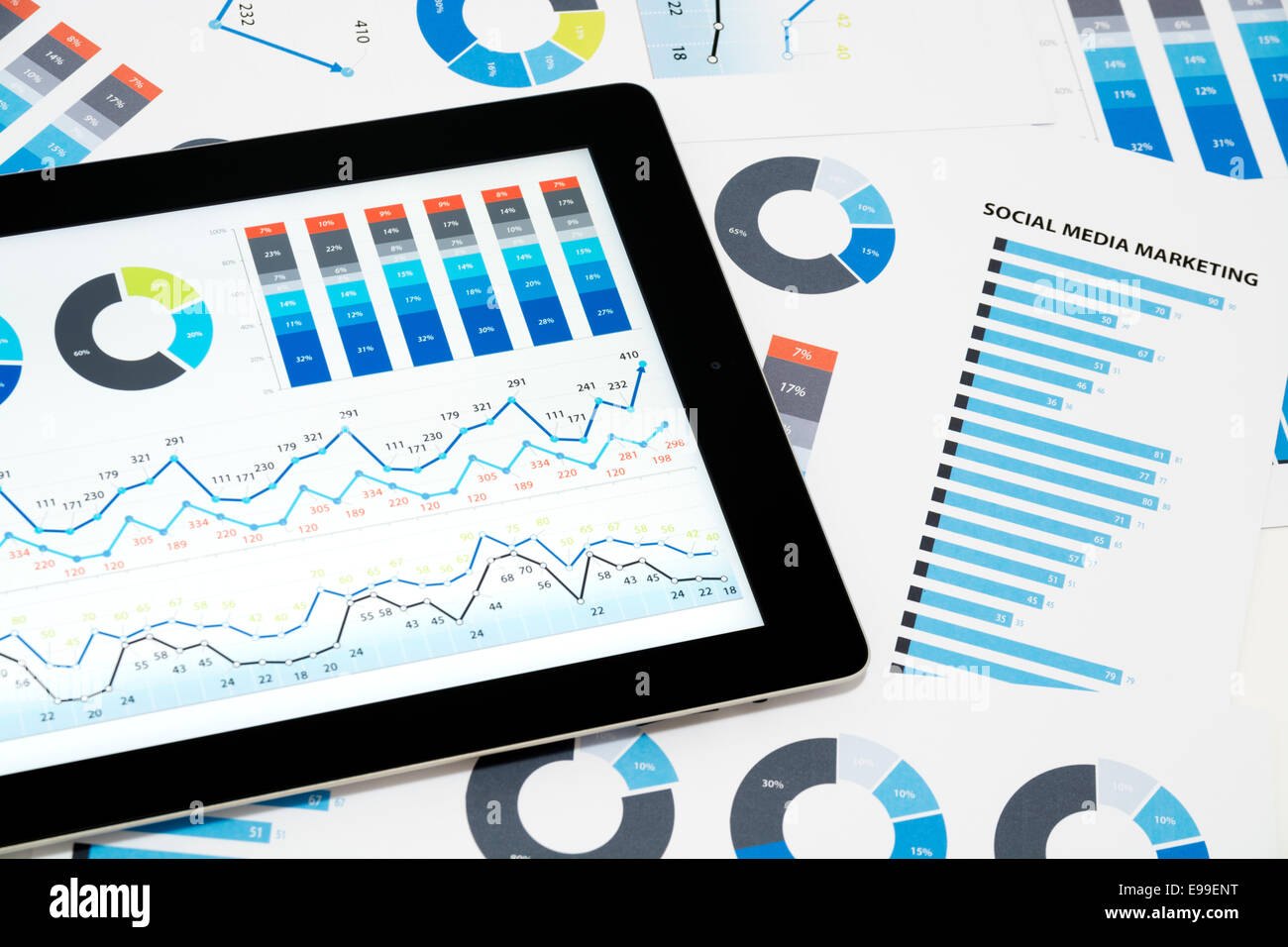 Business charts and diagrams on digital tablet. Stock Photo