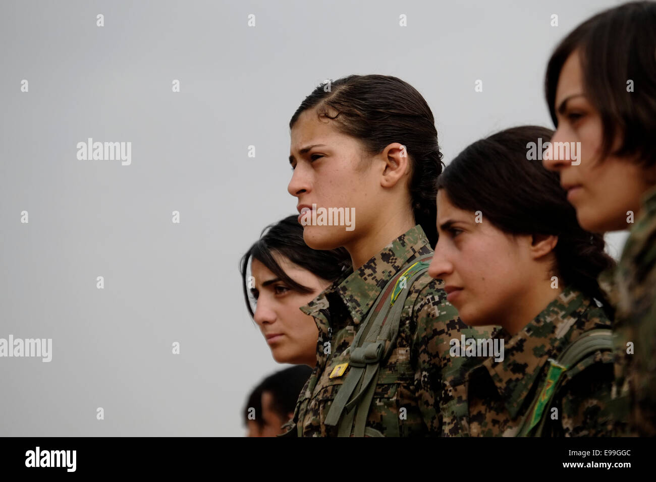Young Kurdish YPJ recruits participate in drill in a military compound in Al Hasakah or Hassakeh district in Rojava the de facto Kurdish autonomous region originating in and consisting of three self-governing cantons in northern Syria Stock Photo