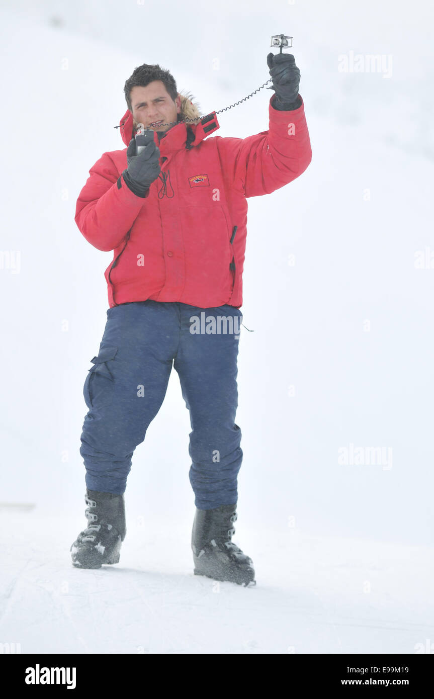 weather meteo man measure wind speed Stock Photo