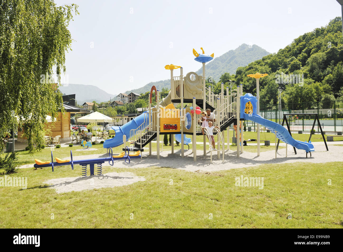family portrait at park playground Stock Photo - Alamy